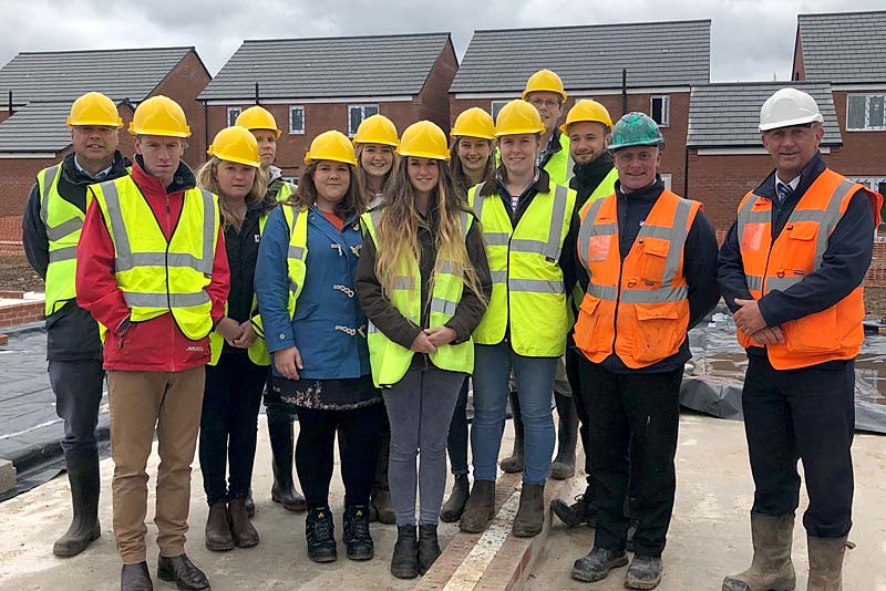 students on building site in newport